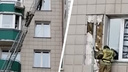 Пришлось разломать фасад: утеплитель загорелся под плиткой многоэтажного дома в Новосибирске