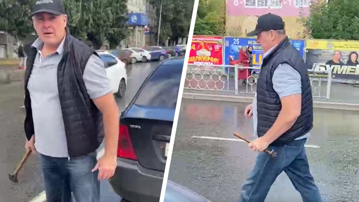 В центре Екатеринбурга водитель с молотком устроил разборки прямо на дороге: видео