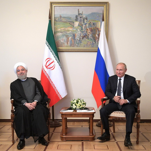 <i class="_">президент Ирана Хаса Рухани и Владимир Путин</i>
