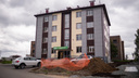 Возле Академгородка построили деревянную многоэтажку — такие дома хотят строить по всей России