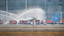 Прилетевший из Новосибирска самолет загорелся в аэропорту Китая