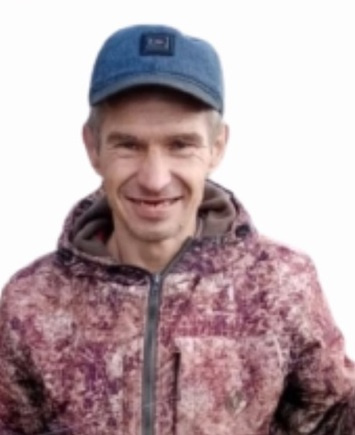 Алексей Утемов был одет в камуфляжный костюм Алексей Утемов был одет в камуфляжный костюм