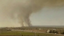 Пожарный поезд тушит пять гектаров горящего камыша под Ростовом