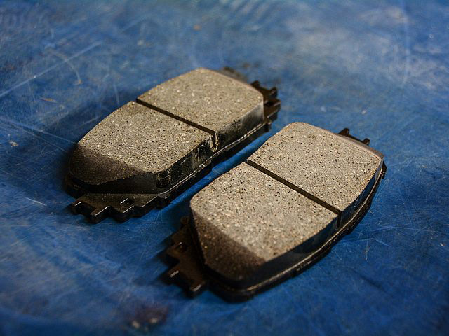 "What is the width of the freshly obtained stopper pads and the least possible measurement for the pads' width? The means to assess the depletion of the brake pads."
