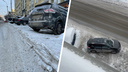 На Советской срезали снег возле <nobr class="_">парковки —</nobr> видео, на котором машина не может съехать вниз на дорогу