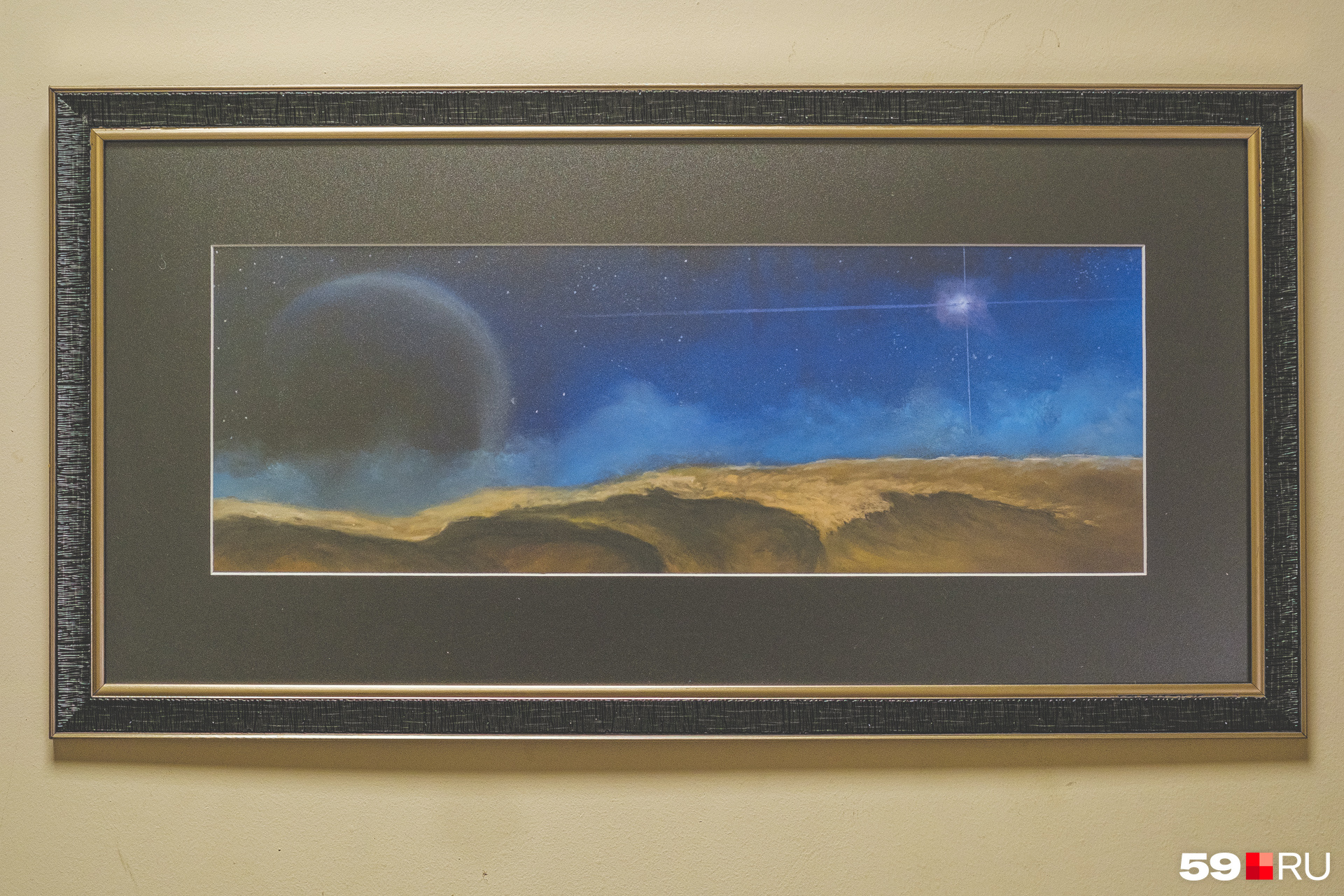 Одна из картин на тему космоса висит у Андрея Николаевича на работе