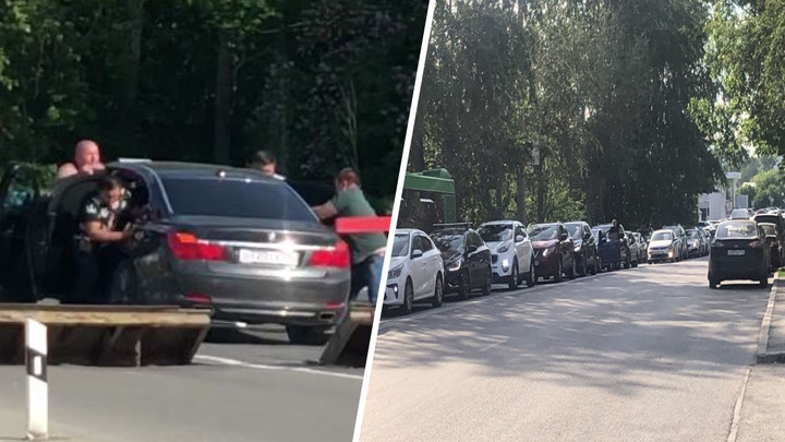 В Екатеринбурге десять мужиков вытолкали застрявшую на железнодорожных путях BMW