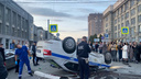 Жесткая авария в центре Новосибирска: автомобиль ДПС перевернулся на крышу