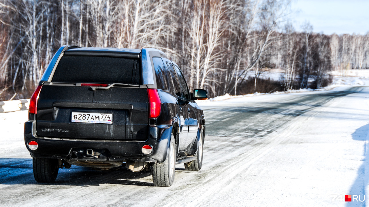 Задняя часть кузова у Envoy XUV — со сдвижной крышей Задняя часть кузова у Envoy XUV — со сдвижной крышей