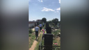 Крушил надгробия и ограды: в Сети появилось видео с буйствующим на Северном кладбище вандалом