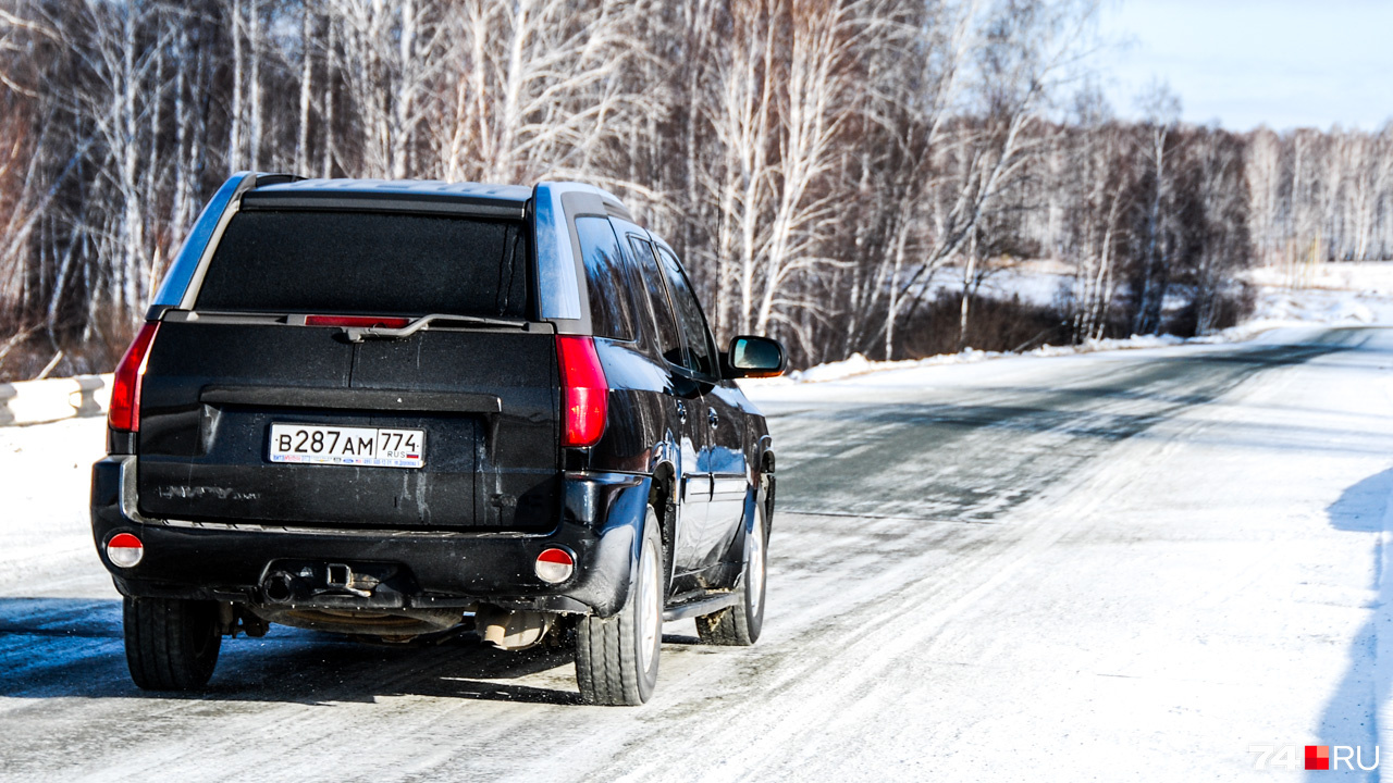 Задняя часть кузова у Envoy XUV — со сдвижной крышей Задняя часть кузова у Envoy XUV — со сдвижной крышей