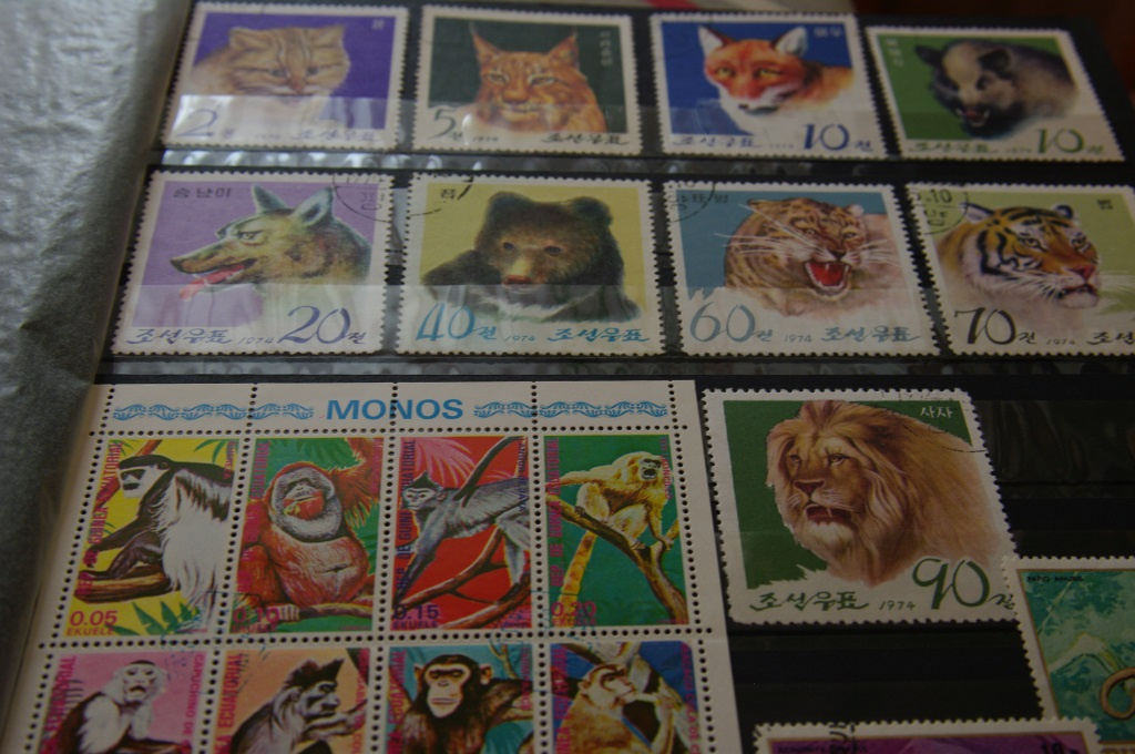 Есть также марки с животными и спортсменами