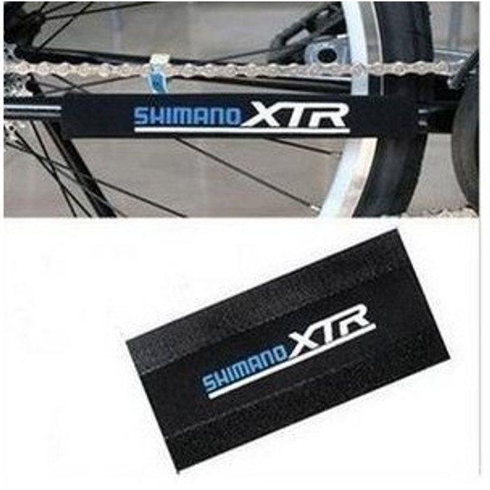 Защита рамы велосипеда. Shimano XTR защита пера. Защита пера от цепи шимано. Защита рамы велосипеда от цепи Shimano. Защита пера велосипеда XTR.