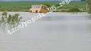 Школьный автобус едва не утонул на дороге в Хорольском районе