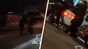 «Запаковали в наручники»: неизвестные прижали человека к машине в Новосибирске — видео