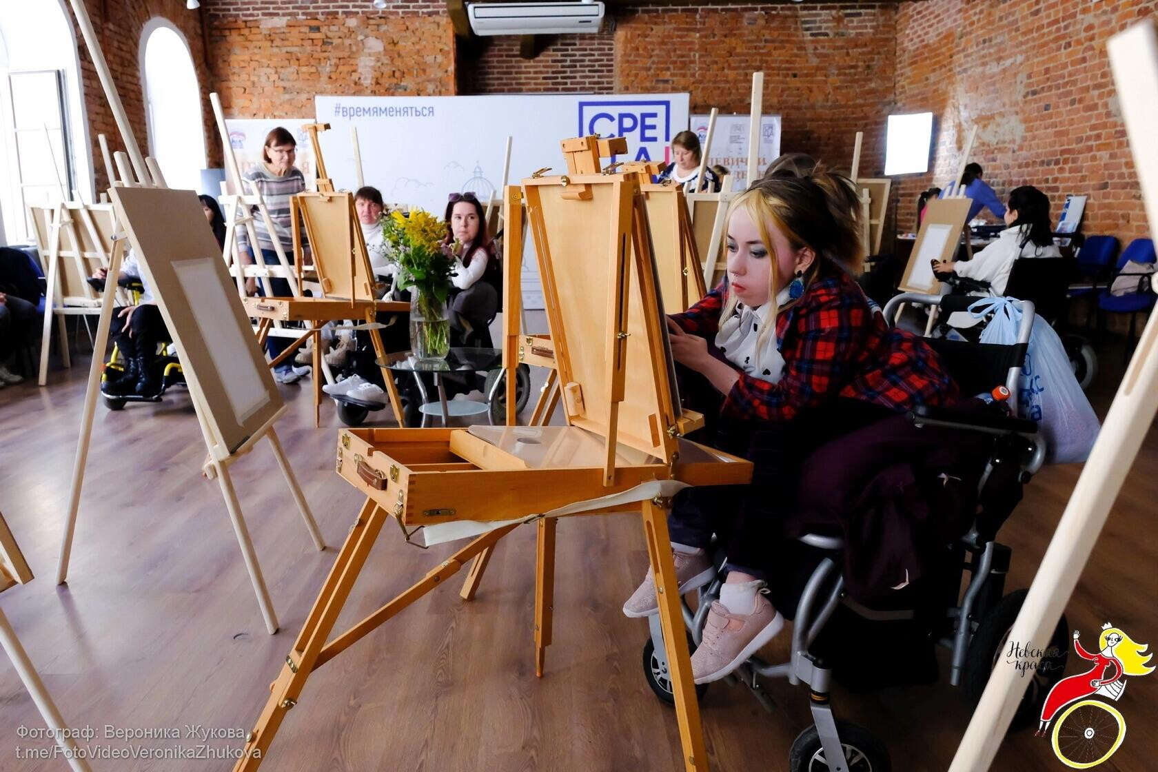 Художник в инвалидном кресле