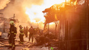 Пламя шло стеной. Пожар на Кировском рынке в 25 фото