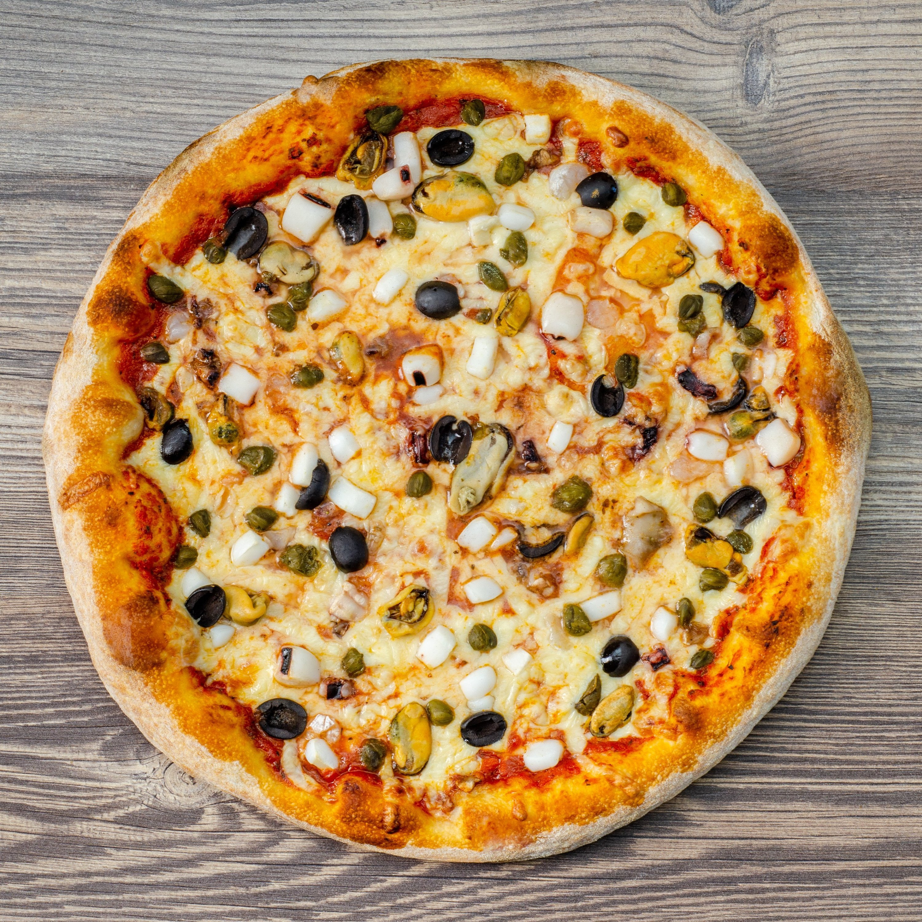 Аппетитная пицца «Фрутти ди маре»